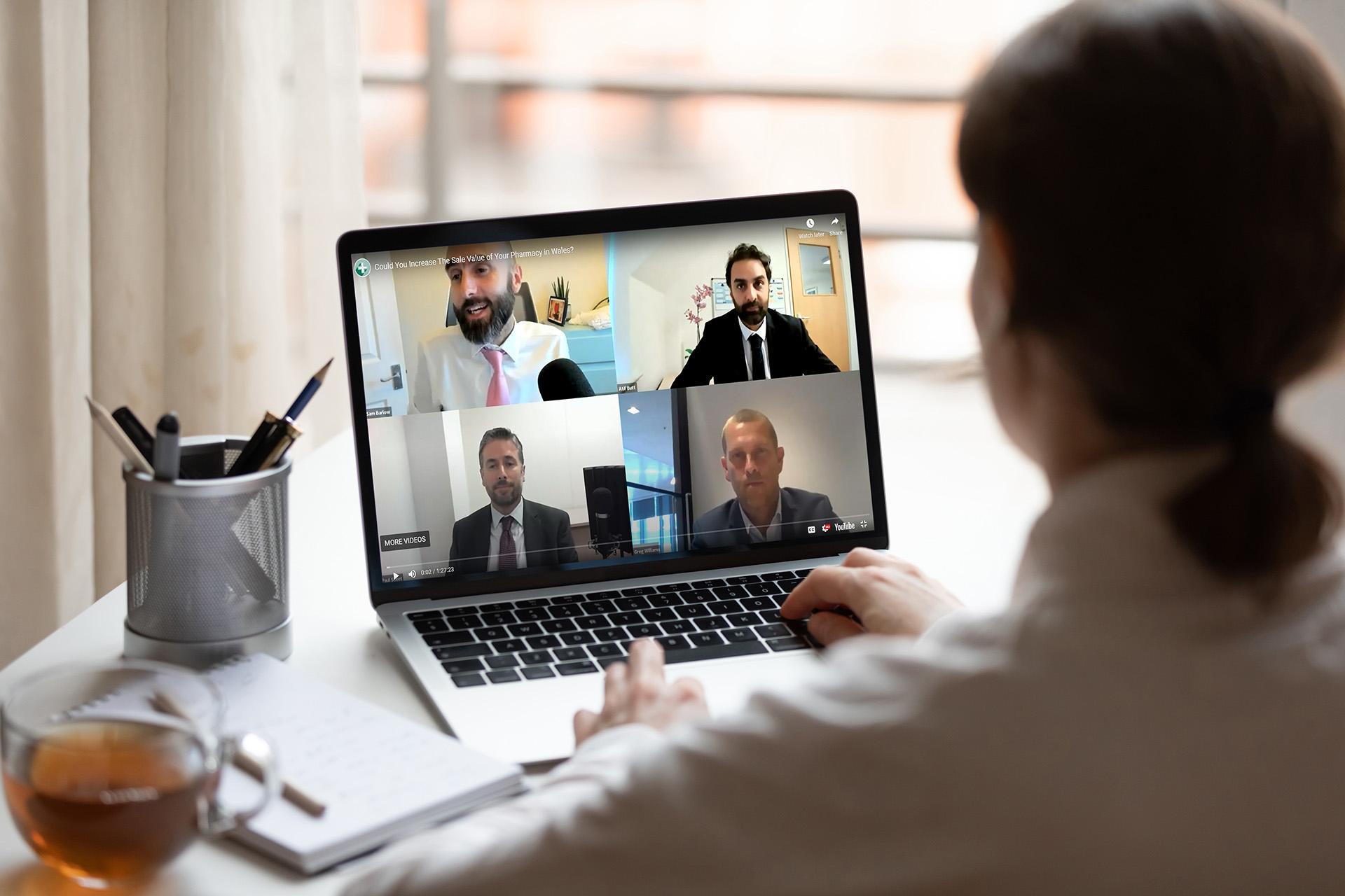 Woman on a conference call with the Hutchings Pharamacy team